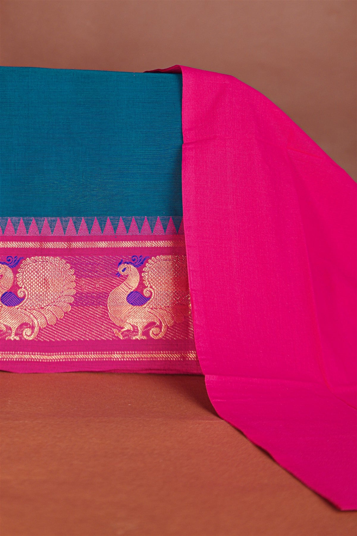 Cotton Teal And Pink Peacock Woven Border Dress Material