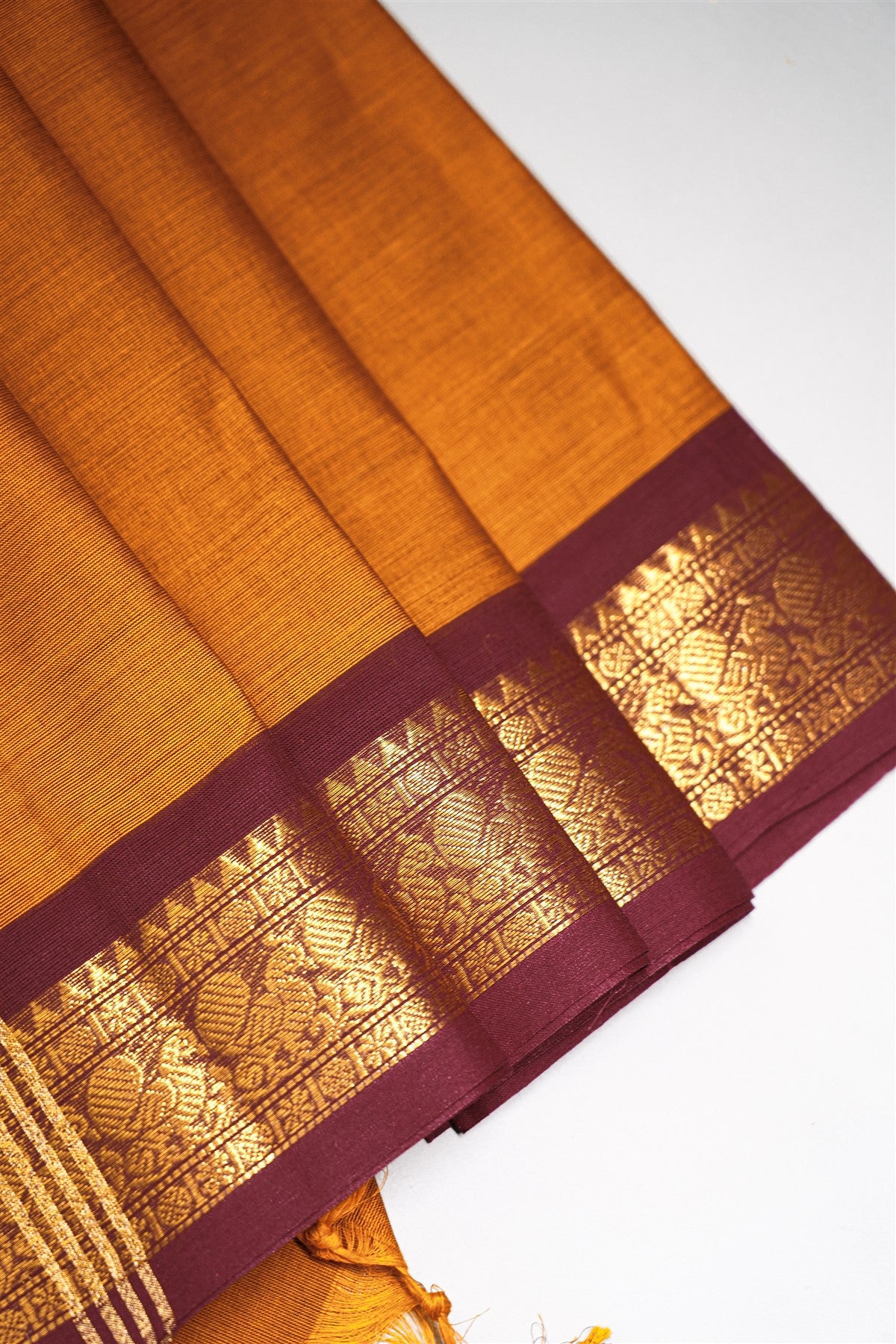 Cotton Mustard Yellow And Maroon Zari Border Dress Material
