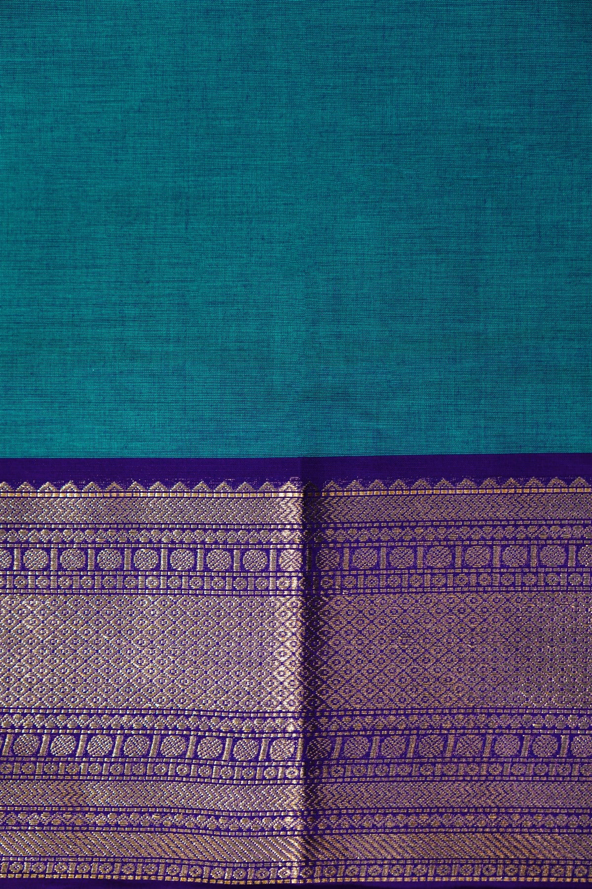 Cotton Teal And Purple Zari Bordered Dress Material