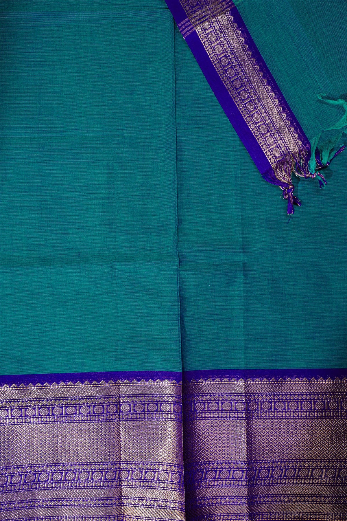 Cotton Teal And Purple Zari Bordered Dress Material