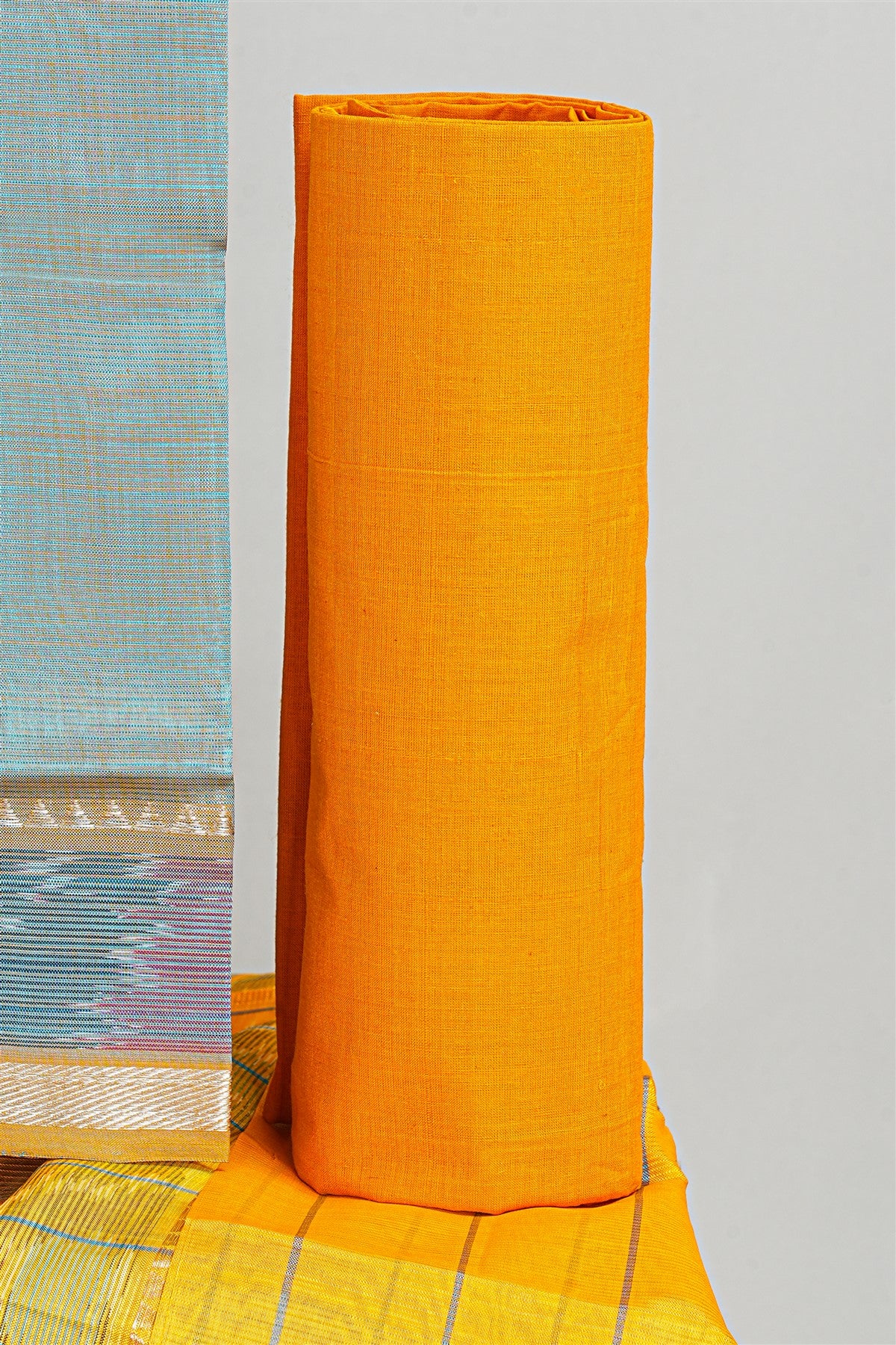 Sico Sea Blue And Yellow Woven Zari Border Dress Material