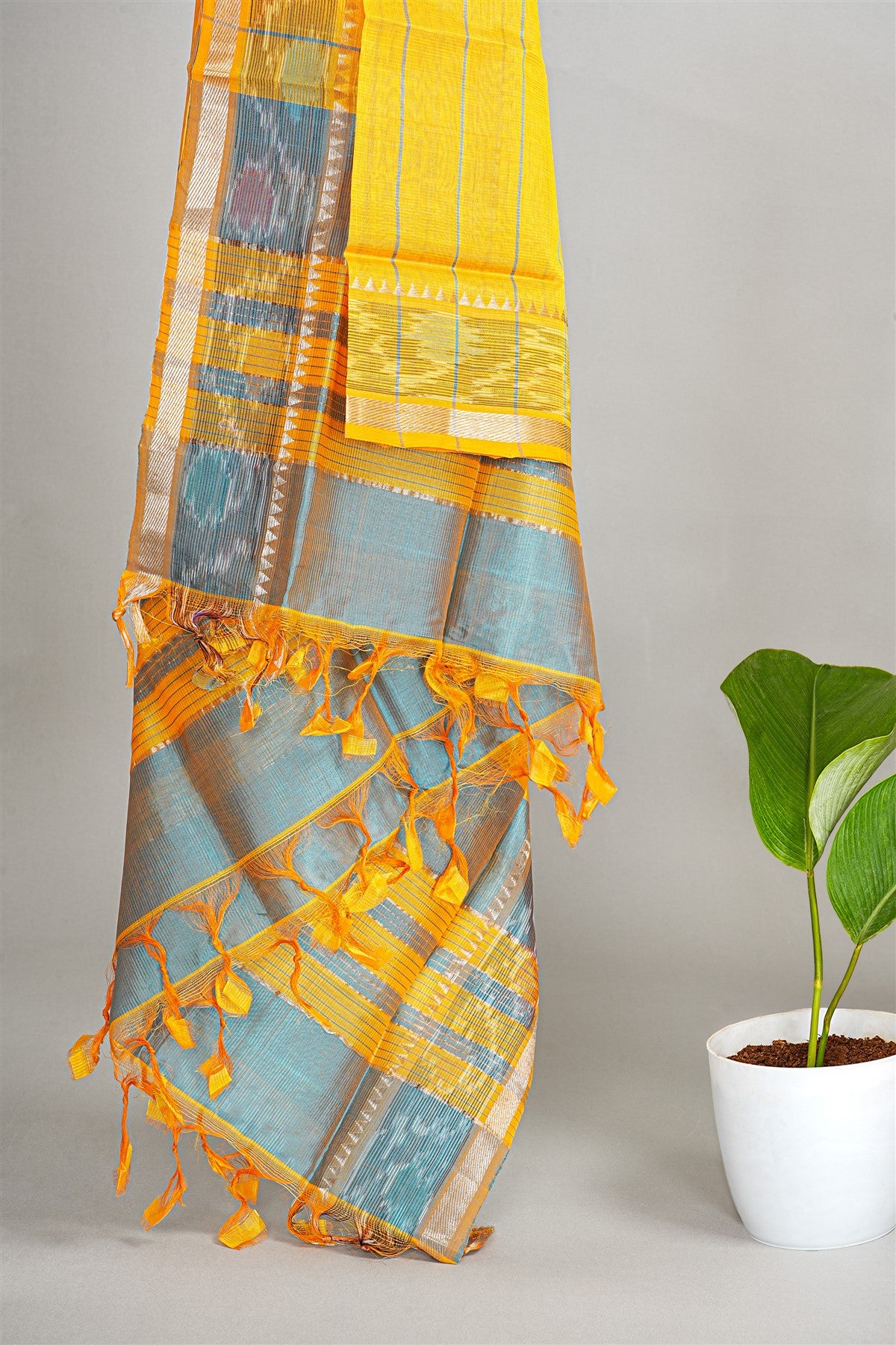 Sico Sea Blue And Yellow Woven Zari Border Dress Material