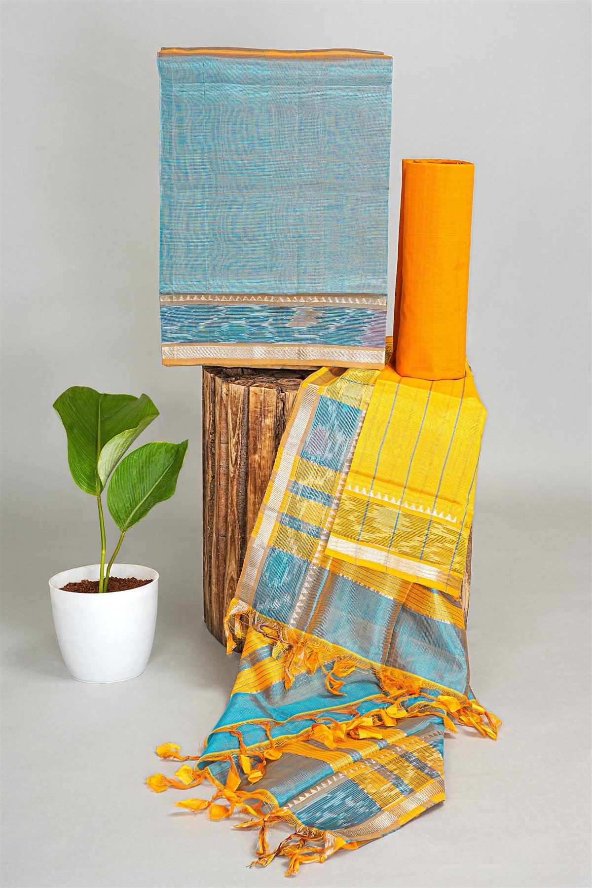Sico Sea Blue And Yellow Woven Zari Border Dress Material